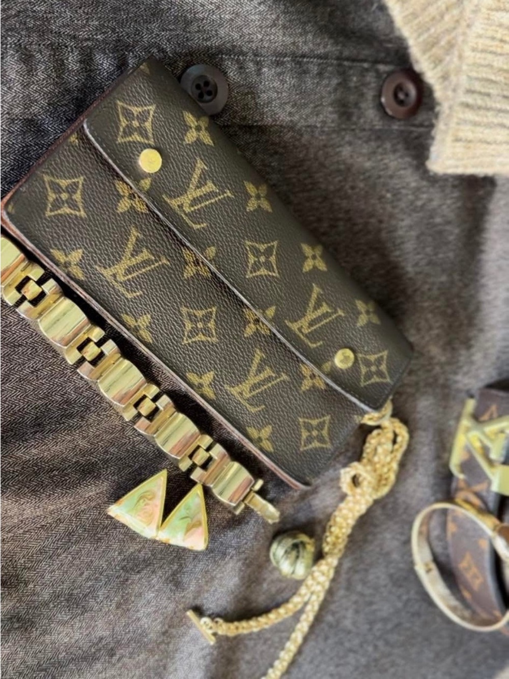 Louis Vuitton Monogram Canvas Accordion Clutch in Brown with Gold Accents